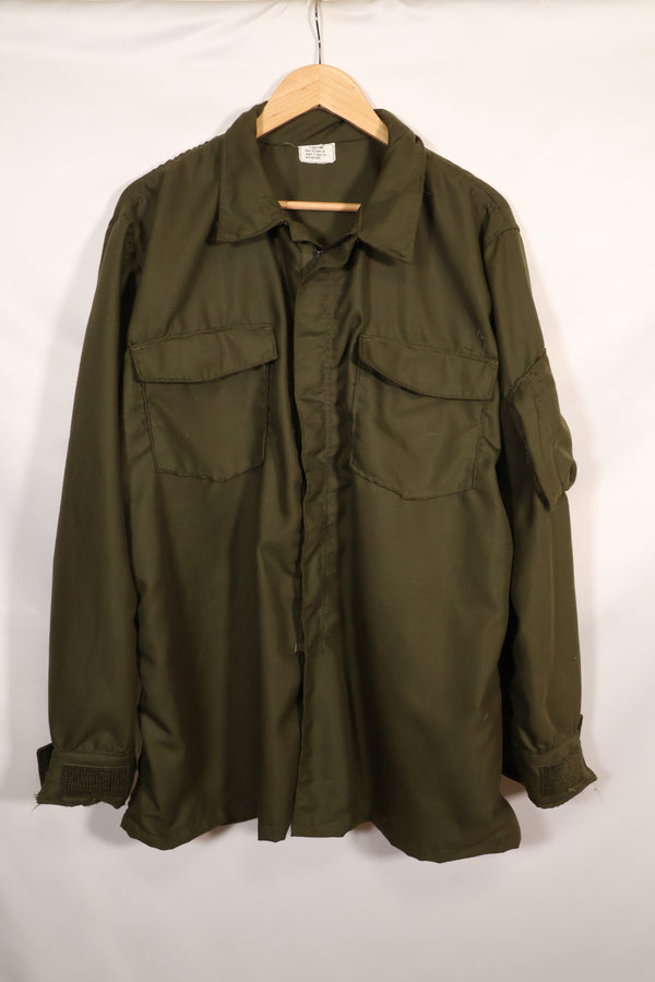 เสื้อเชิ้ตเครื่องแบบนักบินรบ NOMEX ของกองทัพสหรัฐฯ ประจำปี 1971 สัญญา XLL เกือบไม่ได้ใช้