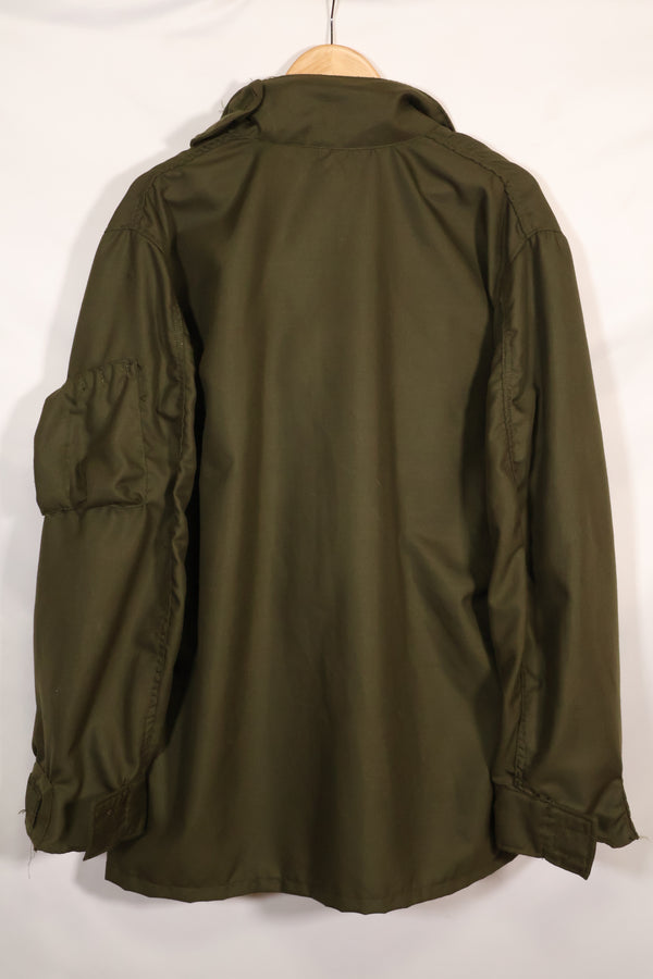 เสื้อเชิ้ตเครื่องแบบนักบินรบ NOMEX ของกองทัพสหรัฐฯ ประจำปี 1971 สัญญา XLL เกือบไม่ได้ใช้