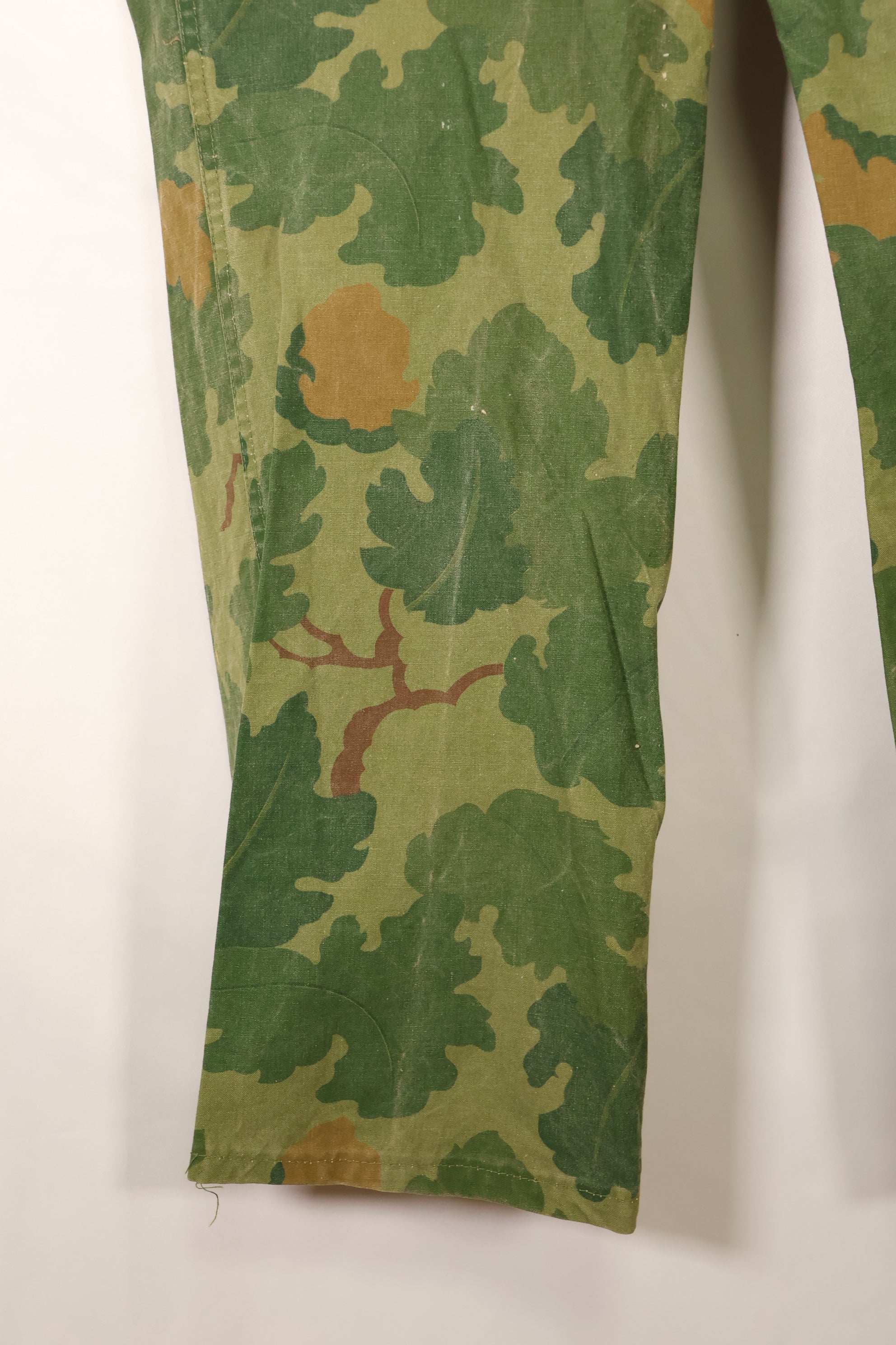 Late 1960s to early 1970s | Privately sourced | Mitchell camouflage | USMC | WWII HBT-style cut | Reversible pants | Used