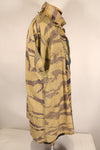 ปลายทศวรรษ 1960 – สวมโดยอดีตที่ปรึกษาของ MIKE FORCE – เสื้อ Gold Tiger US-M ที่มีซิปถูกปรับเปลี่ยน