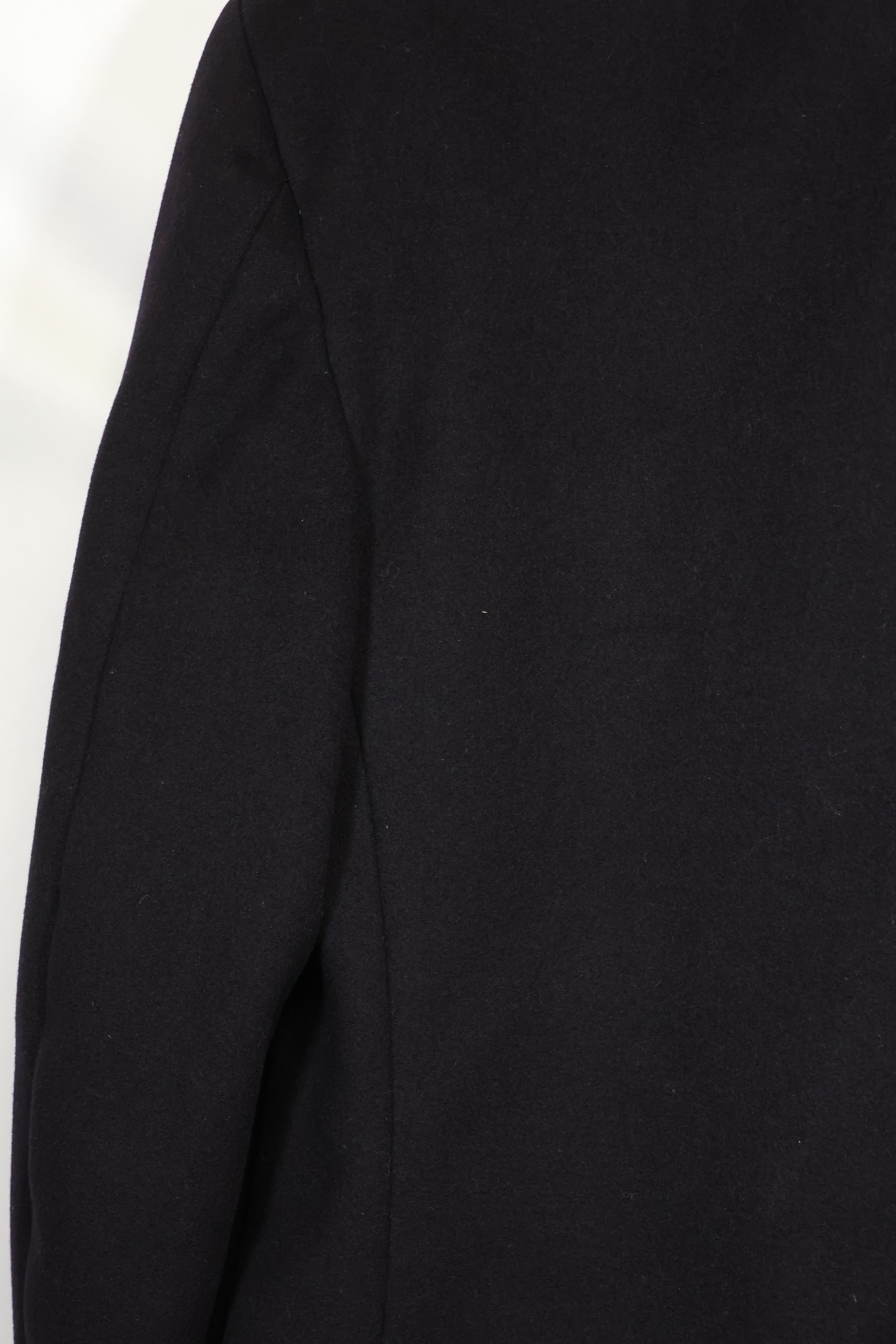 1950's U.S. Navy pea coat, used, slightly worm-eaten.