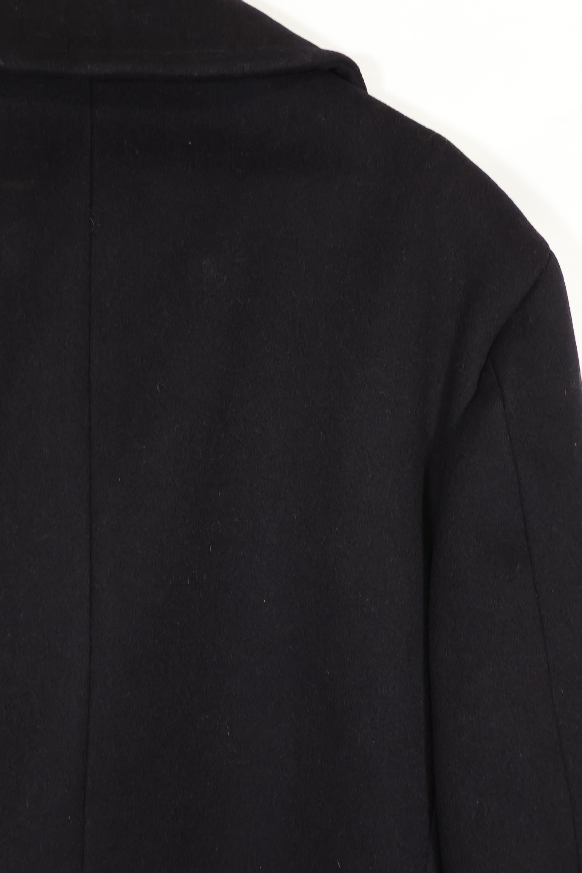 1950's U.S. Navy pea coat, used, slightly worm-eaten.