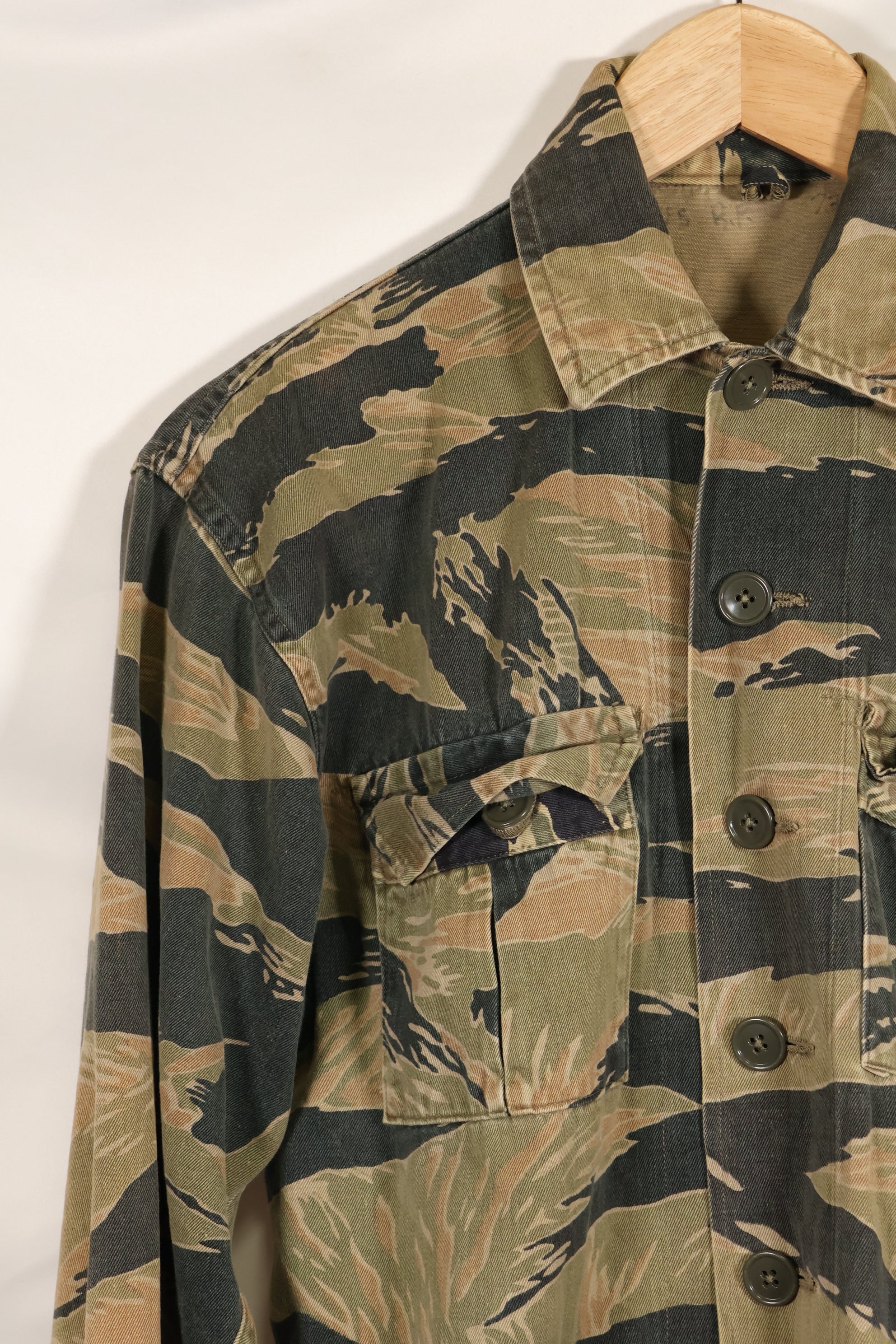 Estimated late 1960s-1970s locally made tiger stripe shirt, used.