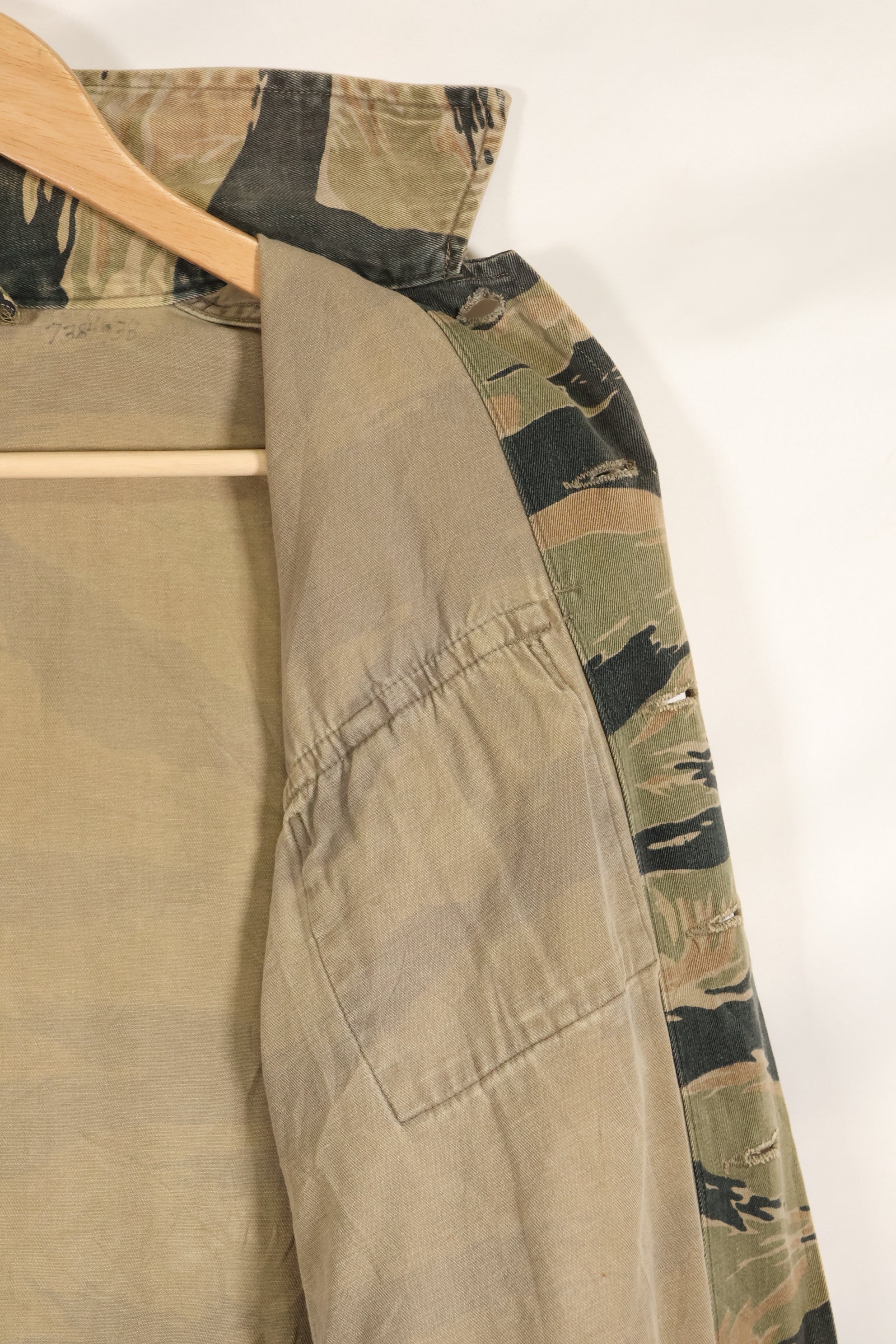 Estimated late 1960s-1970s locally made tiger stripe shirt, used.