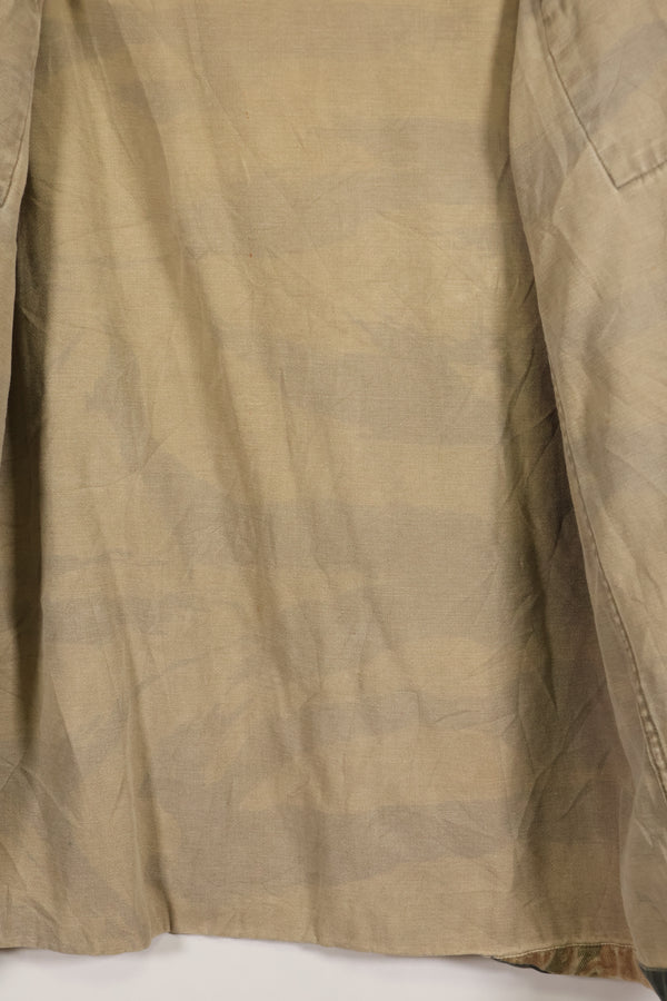 Estimated late 1960s-1970s locally made tiger stripe shirt, used.