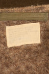 ทศวรรษ 1940, อายุประมาณ 38–40 ปี, เสื้อแจ็คเก็ตบิน B-15A ของกองทัพอากาศสหรัฐฯ (USAAF), ปรับแต่งด้วยขนแกะ, มือสอง