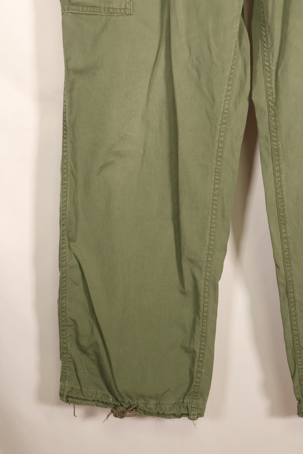 สัญญาปี 1963 – คาดว่าเป็นกางเกงทหารแบบ Jungle Fatigue รุ่นที่ 1 ของ M-S – มีสีจางบางส่วน – มือสอง