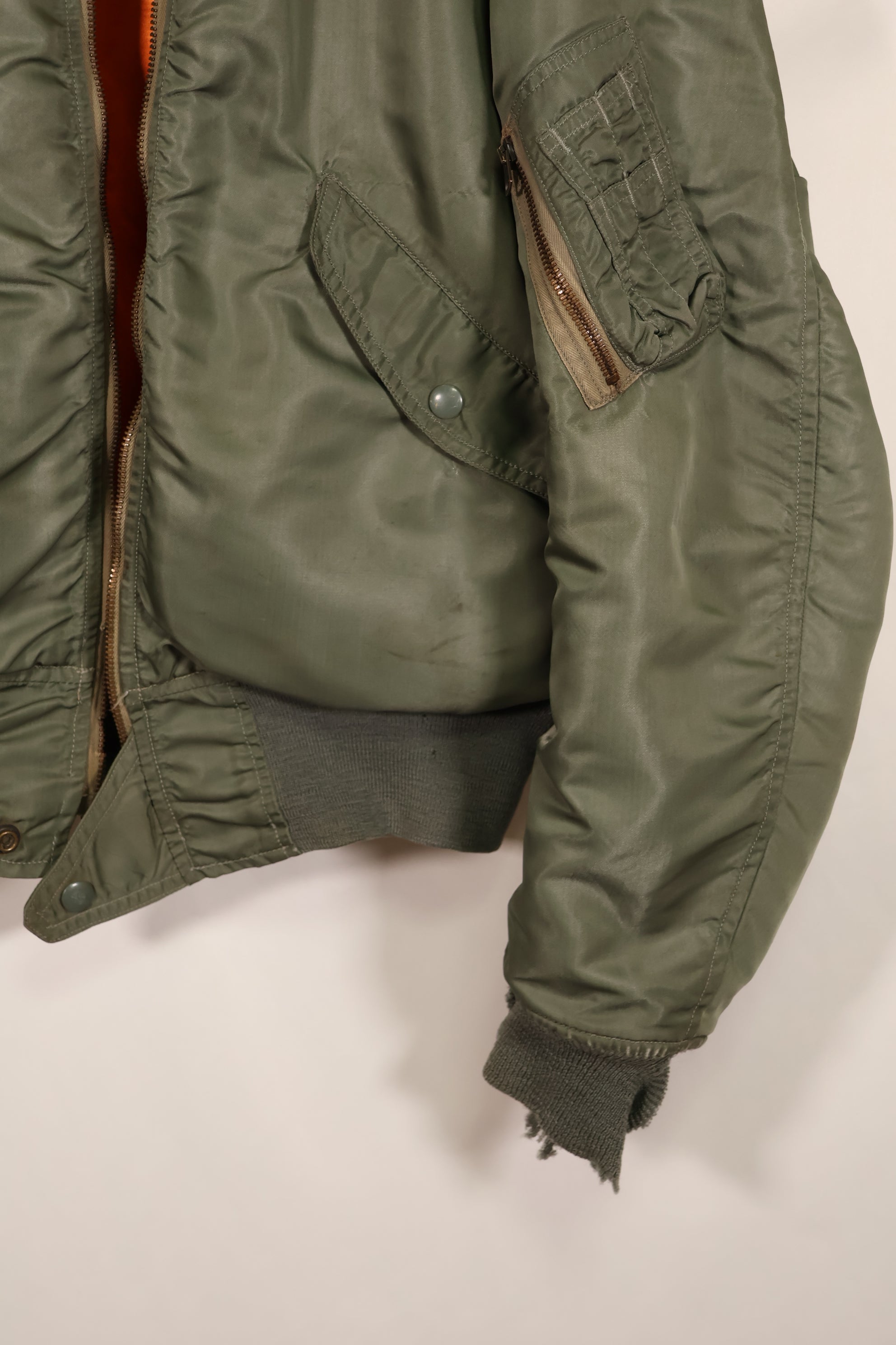 Real early 1960s USAF L2-B flight jacket with damaged ribs, no zipper slider