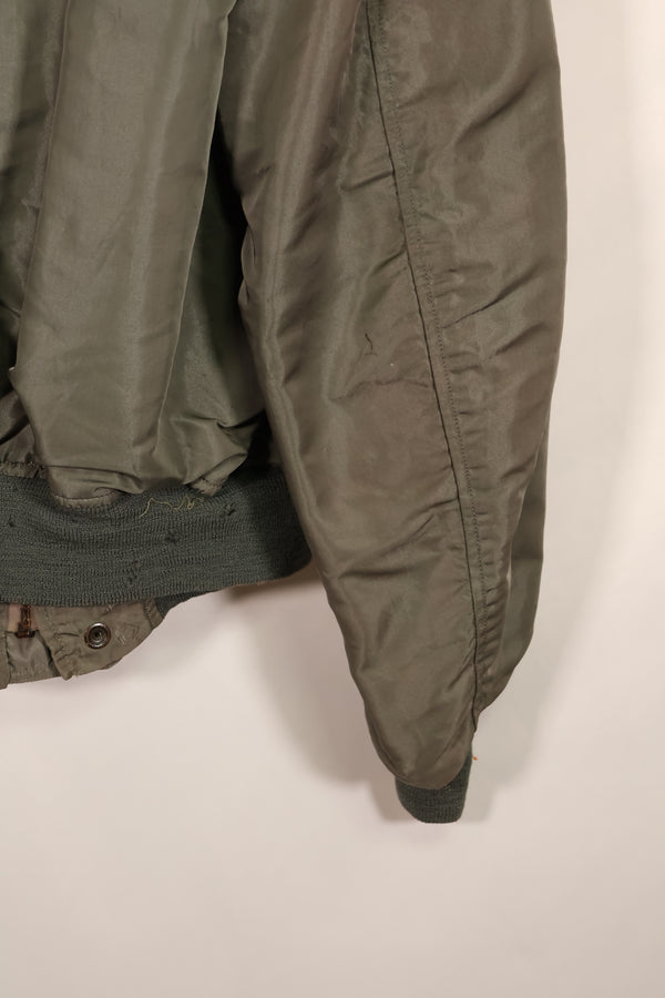 Real 1950s lot USAF L2-B flight jacket without size label, dirty and scratched, used.