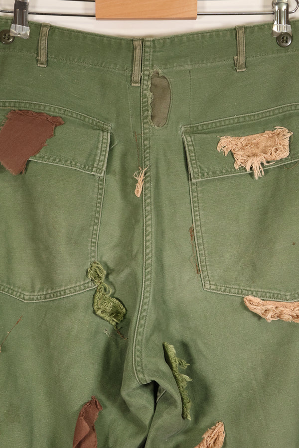 กางเกงยูทิลิตี้ MEDIUM OG-107 รุ่นต้นปี 1960, ประเภท I Baker Trousers, ลายพราง, ปรับเปลี่ยนสำหรับการใช้งานซุ่มยิง