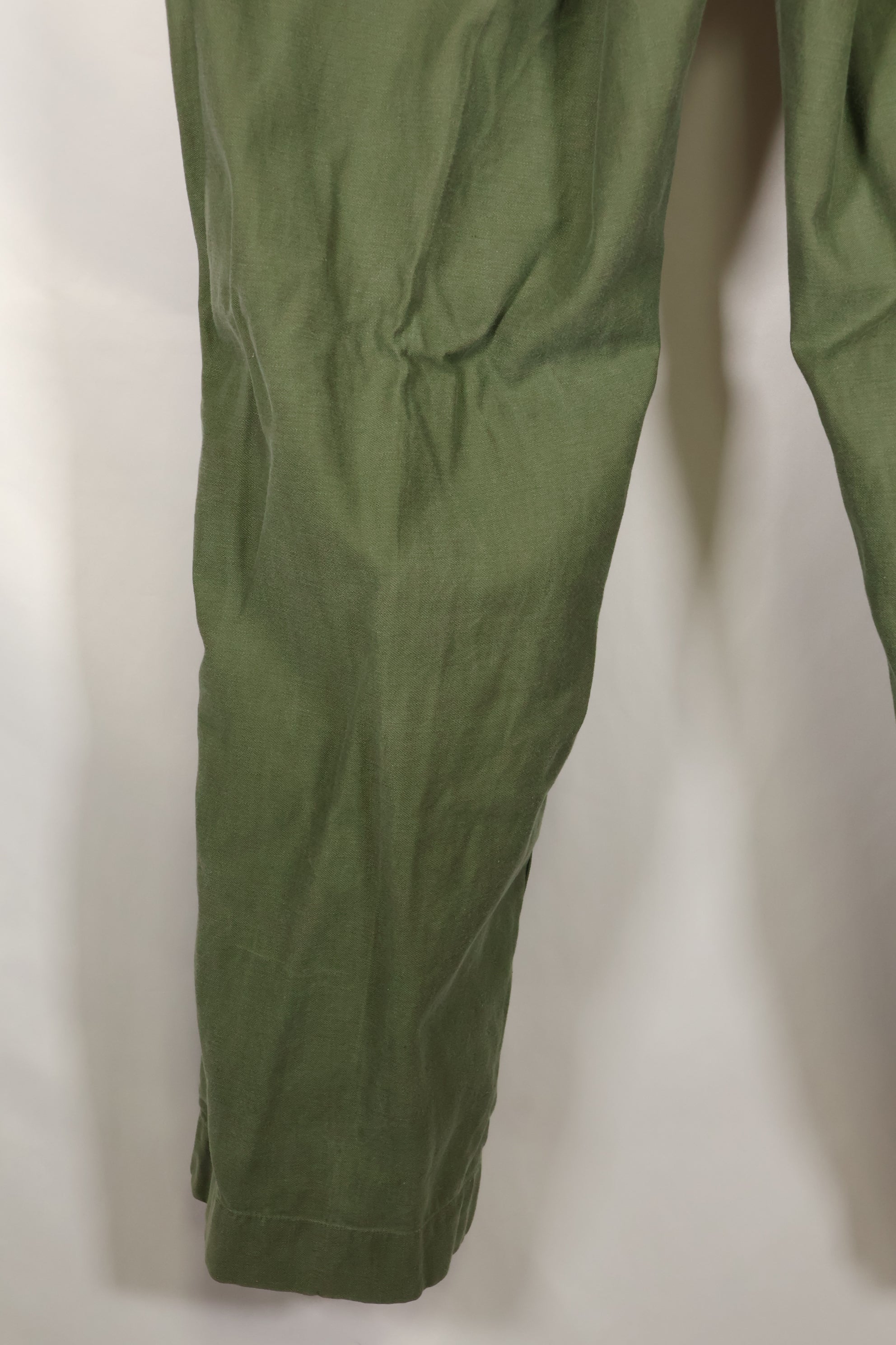 1960s lot, estimated 36 approx USMC P-56 utility pants, used.
