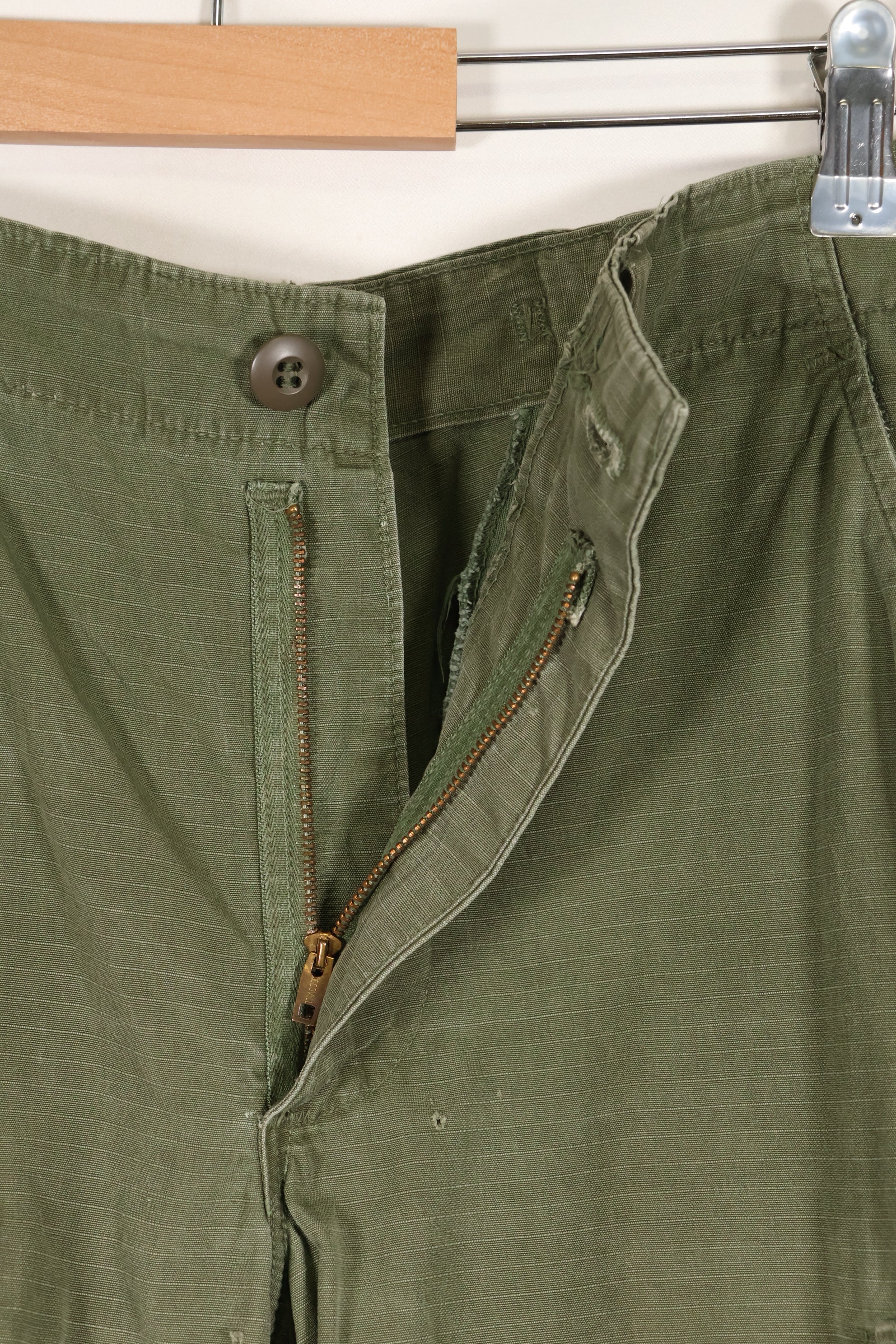 1968 Contract S-R 4th Model Jungle Fatigue Pants, used with fading and repairs.