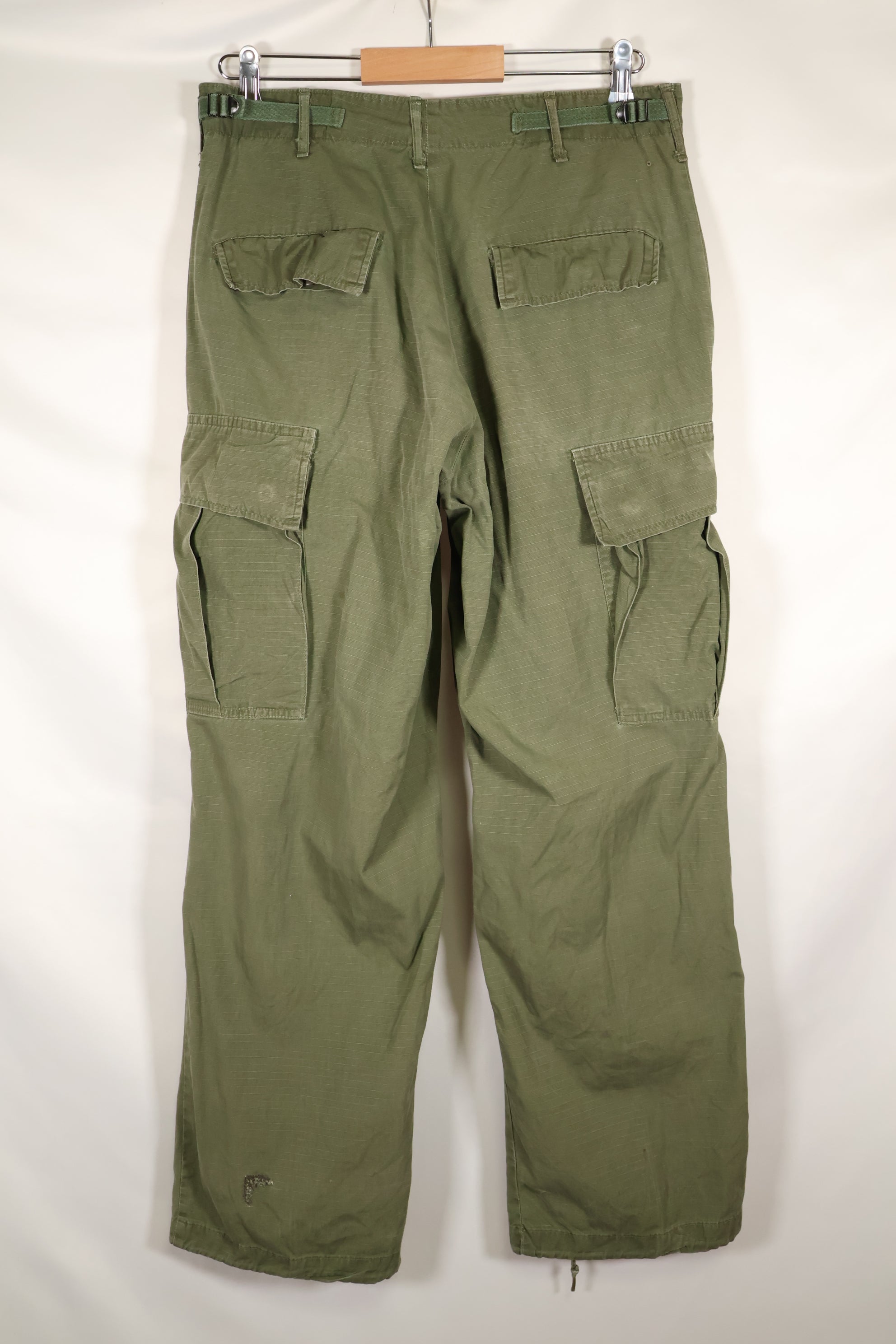 1968 Contract S-R 4th Model Jungle Fatigue Pants, used with fading and repairs.