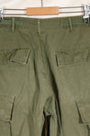 1968 Contract S-R 4th Model Jungle Fatigue Pants, used with fading and repairs.
