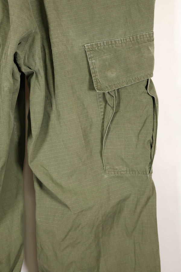 1968 Contract S-R 4th Model Jungle Fatigue Pants, used with fading and repairs.