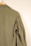 ปลายทศวรรษ 1940–1950: เสื้อยูทิลิตี้ M-47 HBT ของกองทัพสหรัฐฯ พร้อมแผ่นปะ, มือสอง