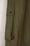Real U.S. Army M45 pants with additional pocket modification, used.