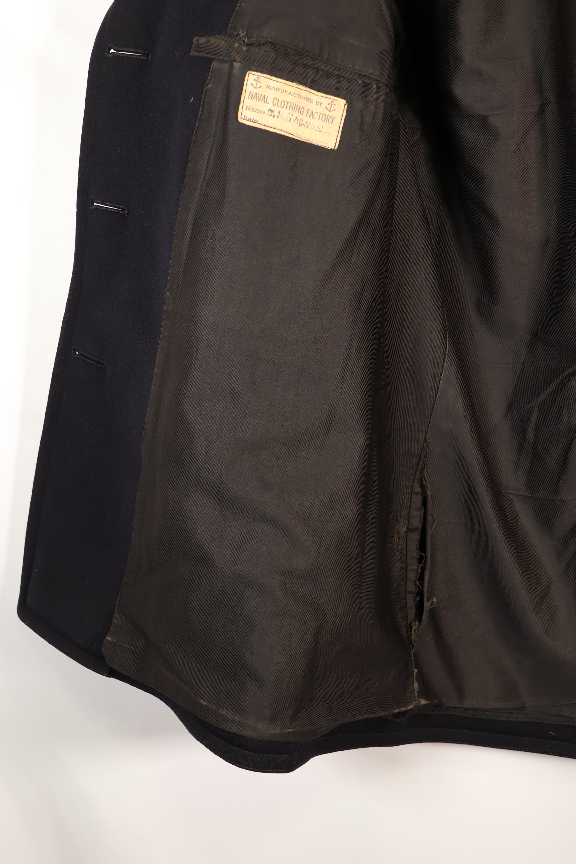 ประมาณปี 1940 ขนาดประมาณ 38 กระดุม 10 เม็ด เสื้อโค้ทของกองทัพเรือสหรัฐฯ สภาพดี B