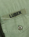 Original U.S. Army Utility Shirt OG-107 with insignia including 1st Division patch (retrofitted)