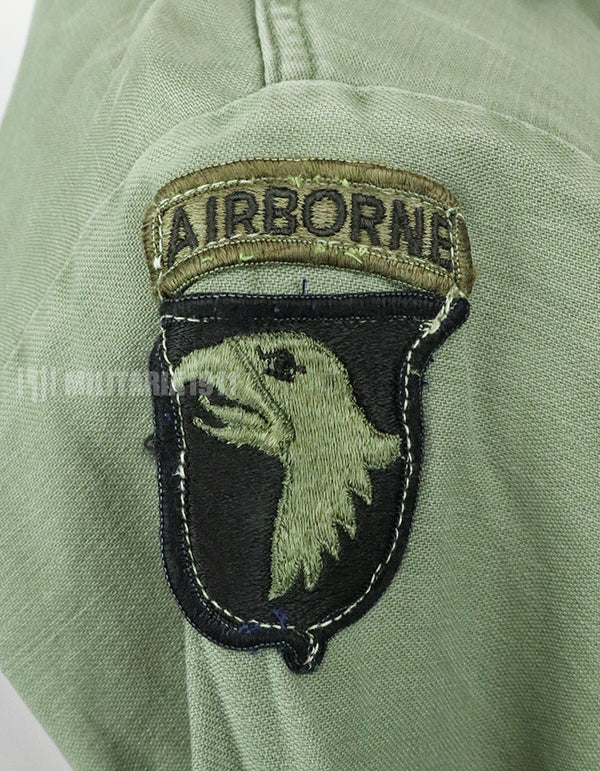 Original U.S. Army Utility Shirt OG-107 with insignia including 1st Division patch (retrofitted)