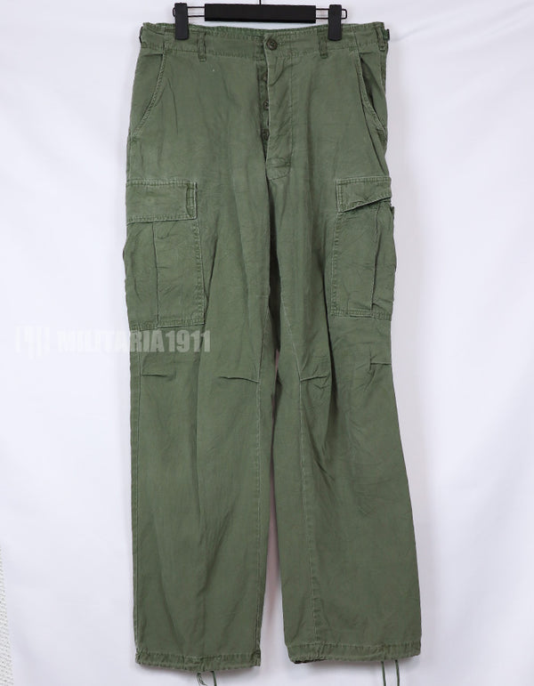 Original 2nd model of jungle fatigues pants, non ripstop fabric, used.