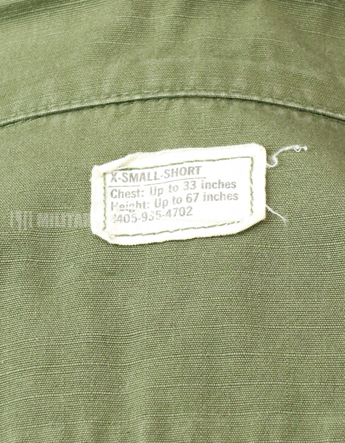 Original Late model, ripstop fabric, jungle fatigues, X-S-S, 1970, missing button, damaged.