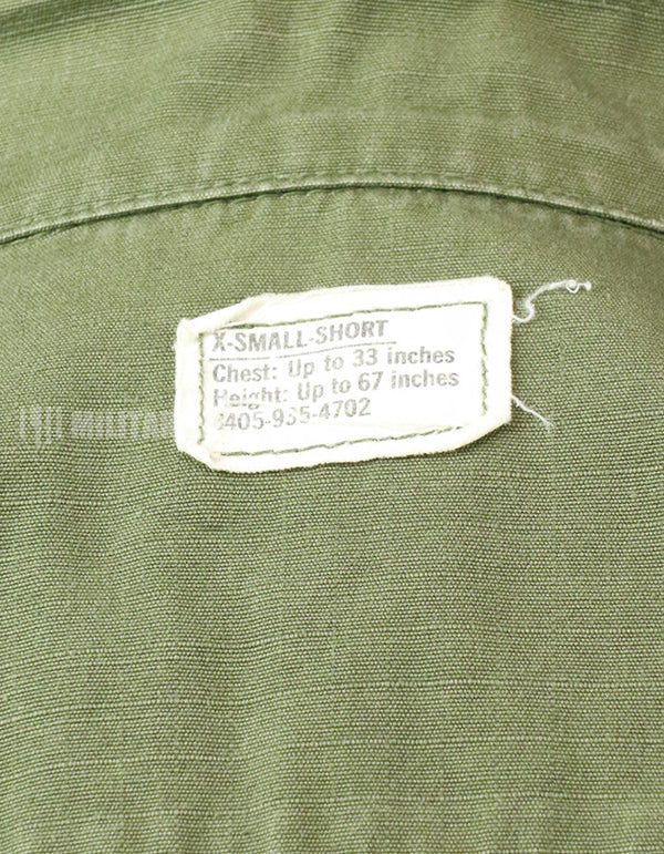 Original Late model, ripstop fabric, jungle fatigues, X-S-S, 1970, missing button, damaged.
