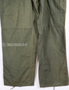 Real 1967 poplin fabric jungle fatigues pants, used, repaired.